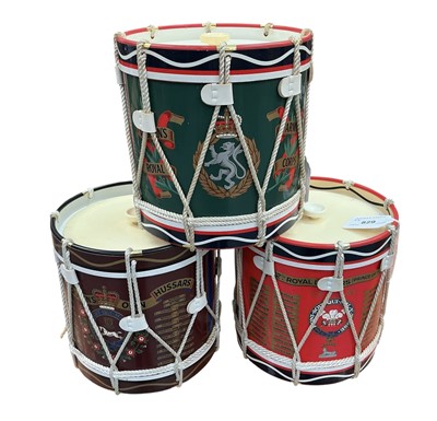 Lot 829 - Group of three mid 20th century novelty military drum-shaped ice buckets for Royal Lancers, Women's Royal Army Corps and Queen's Own Hussars, each 17cm in overall height, (3).