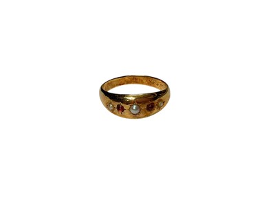 Lot 277 - Antique 18ct gold seed pearl and garnet cabochon gypsy set ring
