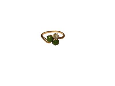 Lot 288 - Old cut diamond and two green cabochon stones trefoil ring in cross-over yellow metal setting, size L