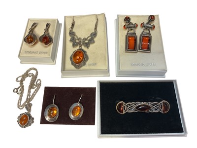 Lot 188 - Group of silver / white metal mounted amber jewellery