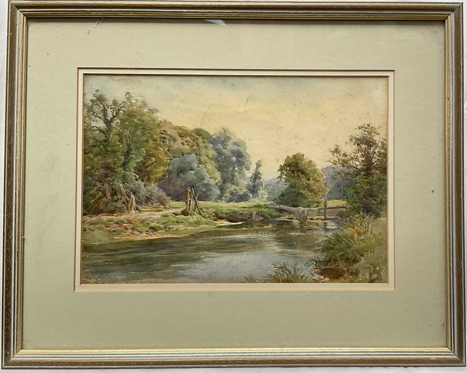 Lot 33 - Charles James Adams (1859-1931) watercolour - River landscape, 18cm x 27cm, glazed frame