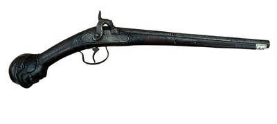 Lot 1004 - Unusual 19th century Turkish percussion pistol with two-stage barrel, full stocked with carved male head pommel and engraved bone mounts 44cm