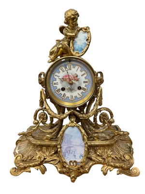 Lot 3068 - Continental gilt metal mantel clock, with Cupid surmount and painted porcelain dial, 40cm high
