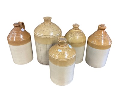 Lot 3102 - Local interest- collection of ten stoneware flagons with naming to include Lay & Wheeler, Nicholl & Miller, Wolton & Attwood and Daniell & Sons, (10).