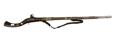Lot 1009 - Old Arab Flintlock jazel musket with brass inlaid decoration and East India Company marked lock 140cm