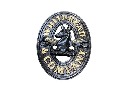Lot 3104 - Vintage Whitbread & Company oval metal pub sign, 33.5cm in length.