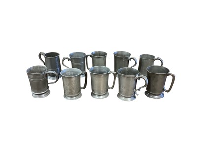 Lot 3107 - Collection of ten 19th century pewter Quart tavern tankards, each with pub / tavern names engraved to bases, (8).