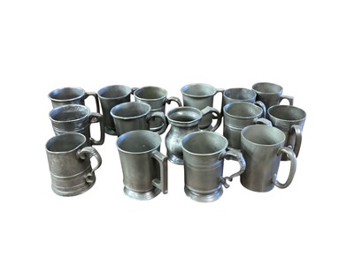Lot 3112 - Collection of fifteen 19th century pewter 1 pint tavern tankards, most with pub / tavern names engraved to them, (15).