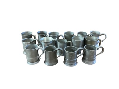Lot 3113 - Collection of fifteen 19th century pewter 1 pint tavern tankards, most with pub / tavern names engraved to them, (15).