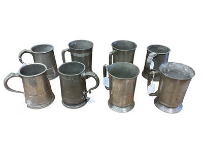 Lot 3117 - Collection of eight 19th century pewter Quart tavern tankards, each with pub / tavern names engraved to bases, (8).