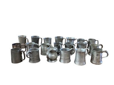 Lot 3118 - Collection of twenty 19th century pewter 1/2 pint tavern tankards, most with pub / tavern names engraved to bases, (20).