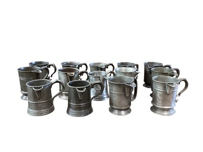 Lot 3121 - Collection of fourteen 19th century pewter Pint tavern jugs, each with pub / tavern names engraved