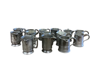Lot 3122 - Collection of fourteen 19th century pewter Pint tavern jugs, each with pub / tavern names engraved
