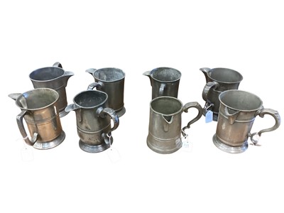 Lot 3123 - Collection of eight 19th century pewter Quart tavern tankards, each with pub / tavern names engraved to sides / bases