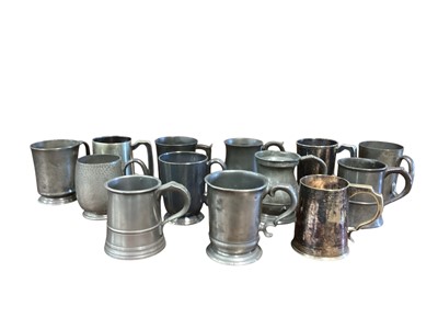 Lot 3124 - Collection of thirteen 19th century pewter Pint tavern tankards, most with pub / tavern names engraved