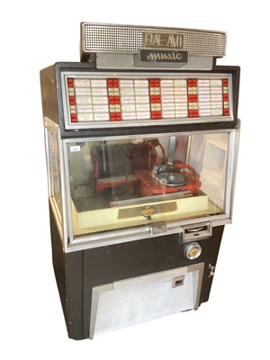 Lot 3025 - 1950s Bal Ami jukebox, with a range of records including Elvis Presley, Nat King Cole, Roy Orbison etc, in working order although requiring some attention, complete with two spare valves.