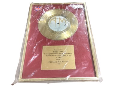 Lot 2738 - Gold presentation disc of The Police 'Message in a Bottle' mounted in glazed frame with presentation plaque - Presented to Nigel Gray to recognise sales in the United Kingdom of more than 500,00...