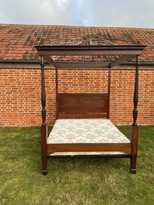 Lot 1542 - Good quality Edwardian Sheraton Revival mahogany four poster bed, the top with domed canopy frame, the frieze with dentil cornice and carved blind fretwork decoration, panelled headboard and tur...