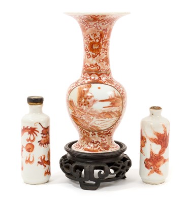 Lot 18 - Small 19th century Chinese porcelain baluster vase, finely painted in iron red enamel and gilt with figural and landscape panels, on a foliate patterned ground, seal mark to base, 14cm high excl...