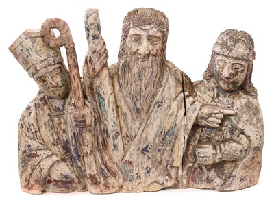Lot 781 - Antique carved and painted wooden sculpture depicting three saints, possibly 19th century Chinese.