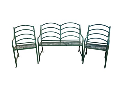 Lot 1530 - Three Regency style green painted wrought iron garden benches and a pair of matching chairs (5)