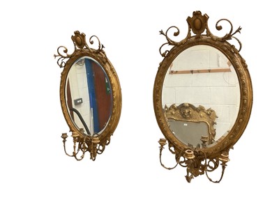 Lot 1495 - Pair of Victorian giltwood and gesso girandole mirrors