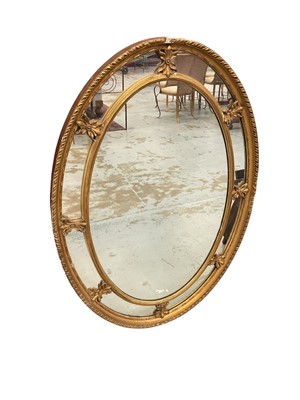 Lot 1492 - Large 19th century oval peripheral plate gilt frame mirror