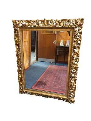 Lot 1493 - Large 19th century Florentine carved and giltwood wall mirror