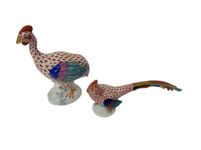Lot 61 - Herend porcelain guinea fowl and golden pheasant (2)