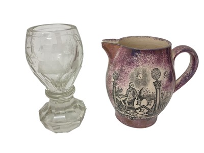 Lot 92 - 19th century Sunderland pink lustre jug with Masonic inscriptions, together with a Masonic toasting / firing glass, (2).