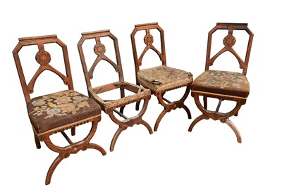 Lot 1422 - Highly unusual set of four 19th century mediaeval revival oak and inlaid side chairs, with triform splat and stuffover seat on X-frame front supports