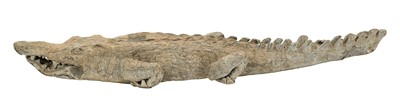 Lot 1438 - Unusual lead garden statue of an alligator, 65cm long