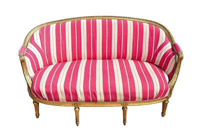 Lot 1439 - 19th century carved giltwood sofa, or curved outline with striped linen upholstery in ornate carved frame on fluted tapered legs, approximately 160cm wide