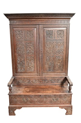 Lot 1478 - 18th century style carved oak bacon settle, with 134cm wide x 64cm deep x 193cm high