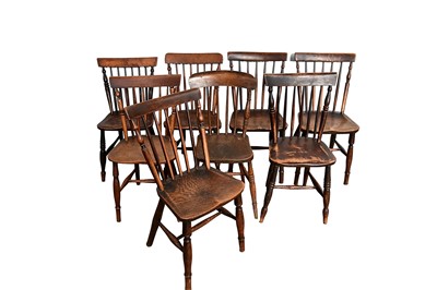 Lot 1481 - Near set of eight 19th century ash and elm stick back chairs, each with bar back and saddle seat on ring turned legs and stretchers