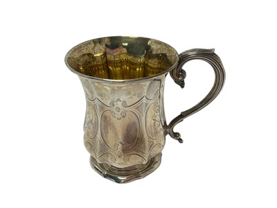 Lot 293 - Victorian silver christening mug of panelled form, with engraved scroll and floral decoration