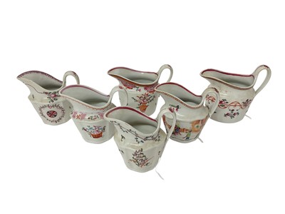 Lot 101 - Six New Hall porcelain cream jugs, late 18th century, decorated in polychrome enamels with foliate patterns and one printed in the Chinese style