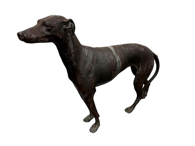 Lot 1515 - Impressive pair of antique lead models of greyhounds, standing pose, one figure detached at central vertical seam, and with one leg detached, 100cm long