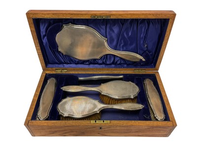 Lot 302 - Early George V silver dressing table set in fitted oak case