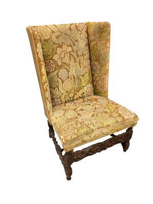 Lot 1505 - 18th century upholstered side chair with shallow wings to back and finely carved stretcher to front