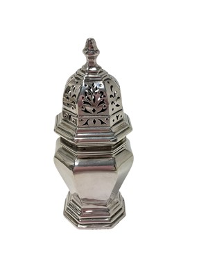 Lot 308 - Edwardian silver sugar caster of octagonal form, with pierced slip on cover, on a stepped base