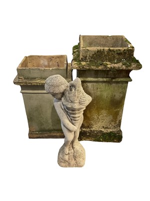 Lot 1540 - Two antique terracotta chimneys, the tallest 80cm high, together with a concrete garden fountain. (3)