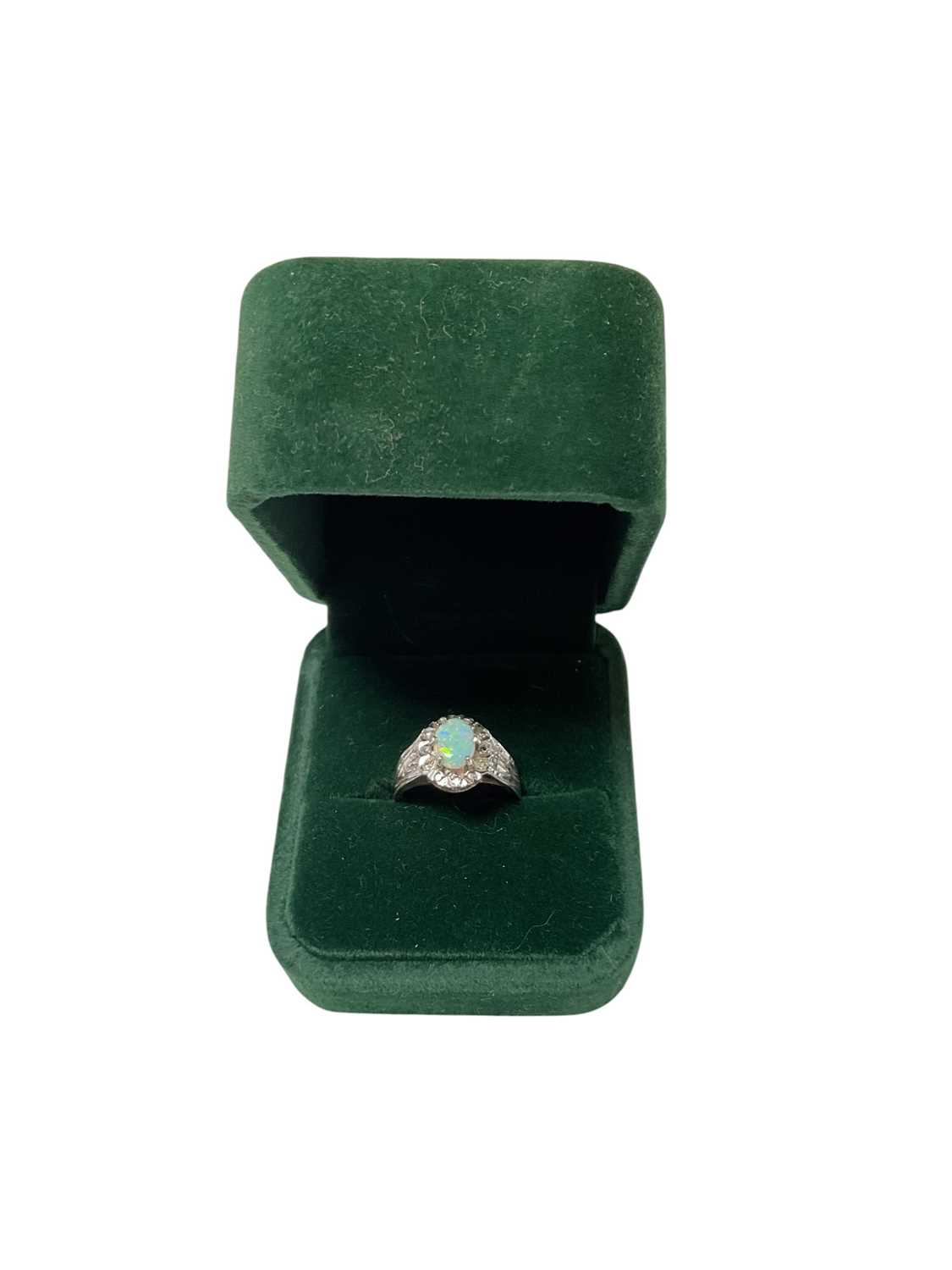Lot 74 - 1970s opal and diamond cluster ring in 9ct white gold setting, size K½