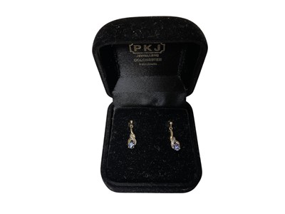 Lot 76 - Pair of tanzanite and diamond pendant drop earrings in yellow metal setting