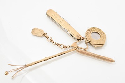 Lot 714 - 9ct gold key ring with a 9ct gold mounted pen knife, cigar cutter, retractable pencil, swizzle stick etc