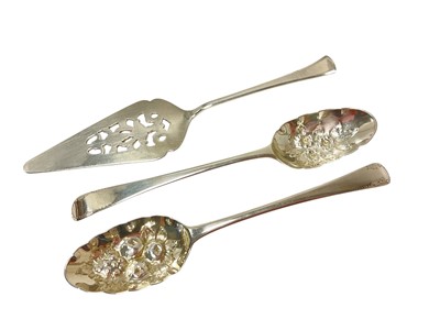 Lot 369 - Pair of Georgian silver table spoons, later converted to berry spoons and a cake slice