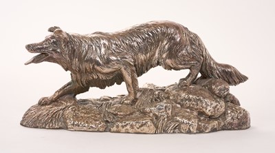 Lot 451 - Contemporary silver (filled) model of a collie dog, (London 1991), maker Langfords Silver Galleries, 19cm in overall length.