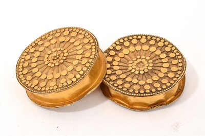 Lot 863 - Two yellow metal ear spools, probably Swahili