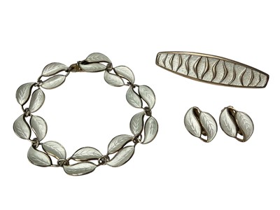 Lot 97 - David Andersen Norwegian silver and white enamel leaf bracelet and matching pair of clip on earrings, together with a similar David Andersen silver and white enamel brooch
