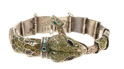 Lot 665 - Silver and enamel snake bracelet